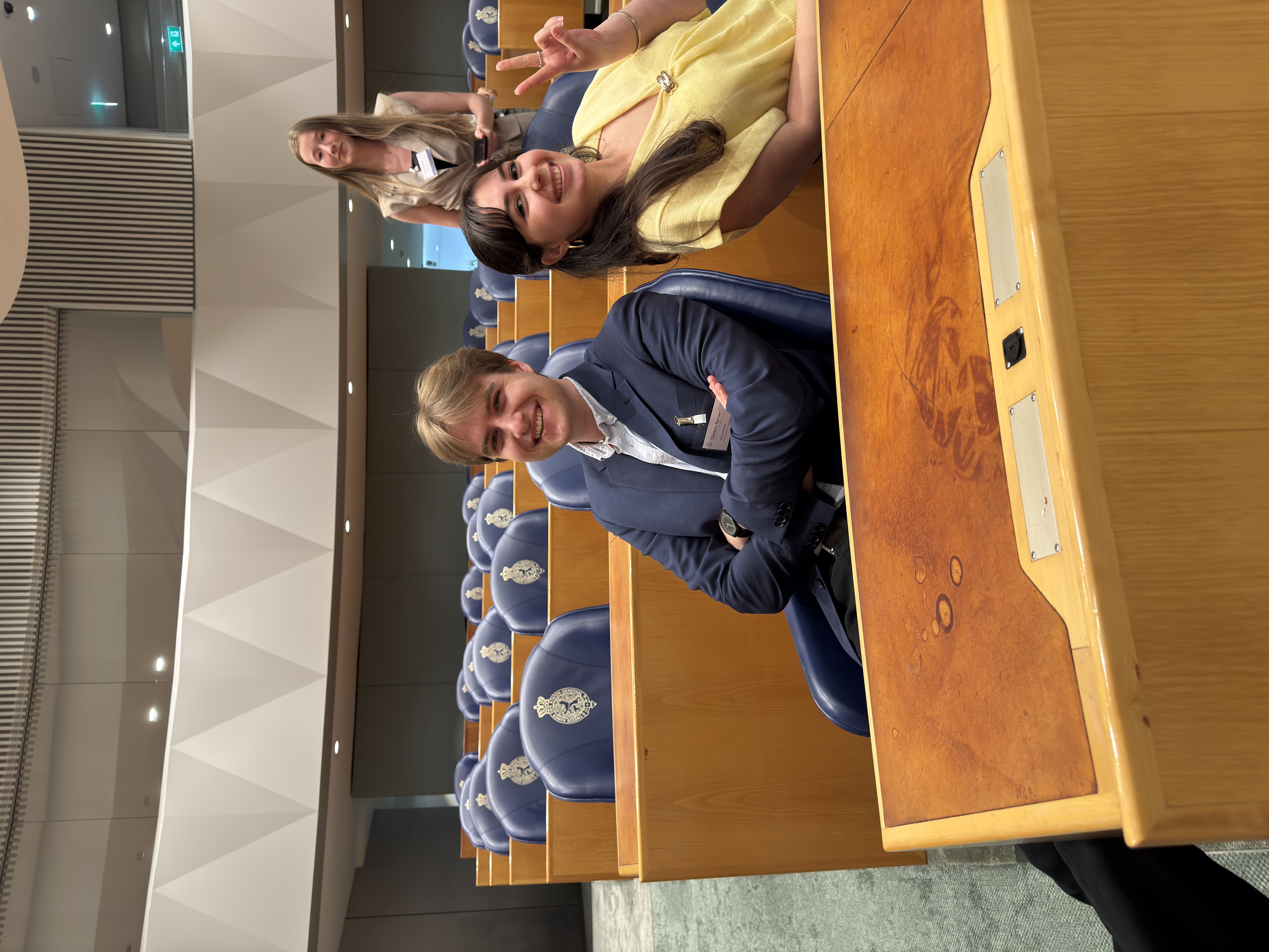 In a parliament seat during the V-100